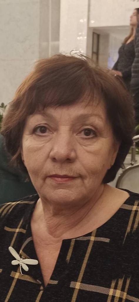 Мила