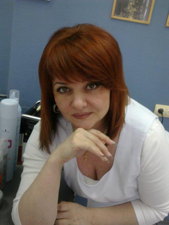 Мила