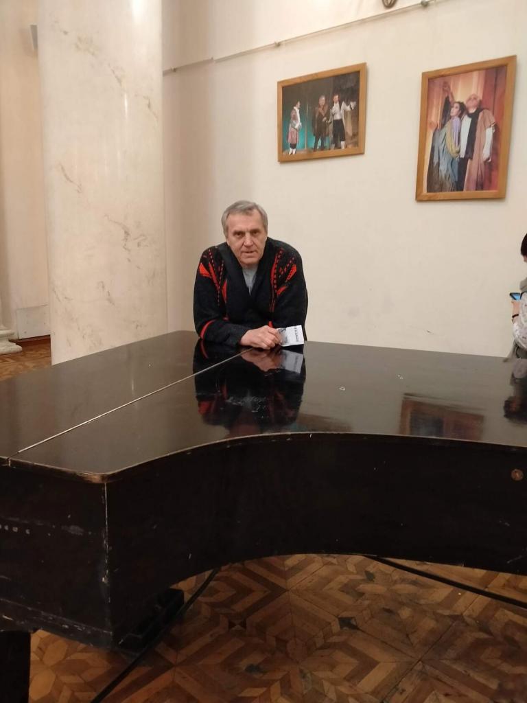 Николай
