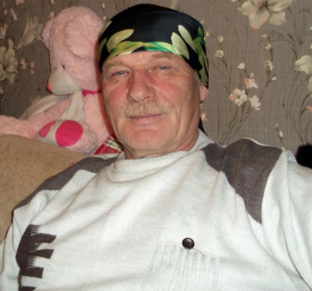 николай