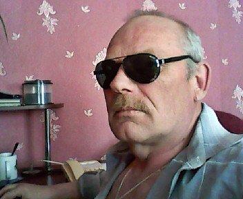 николай