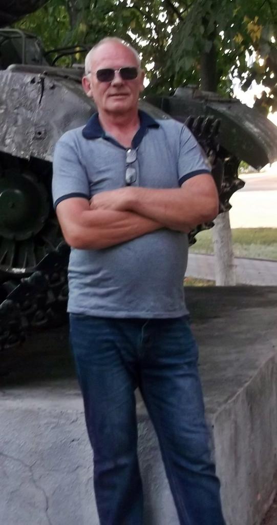 николай