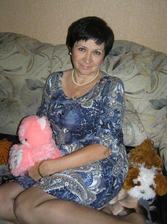 Мила