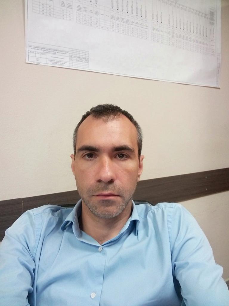Николай