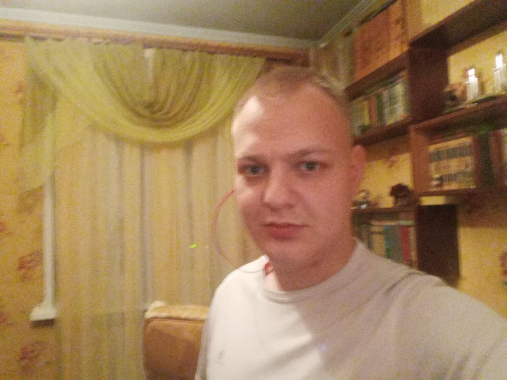 Николай