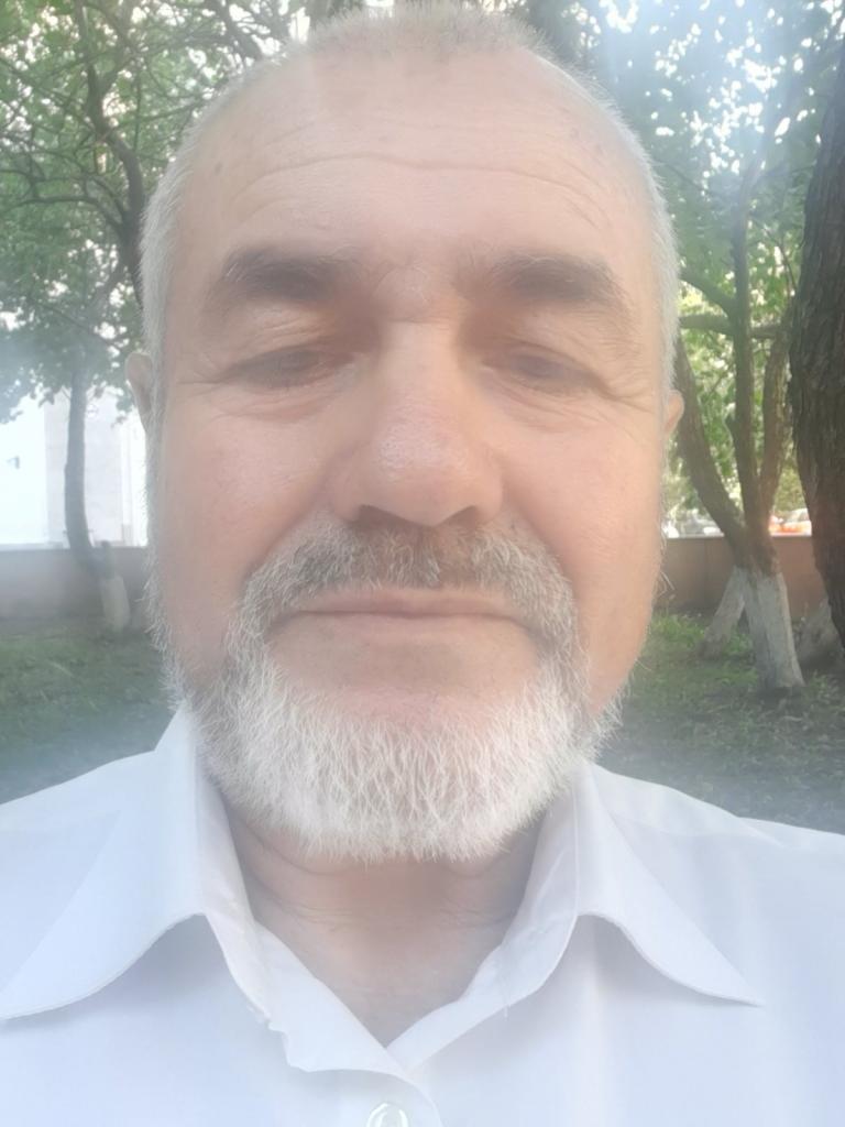 Николай