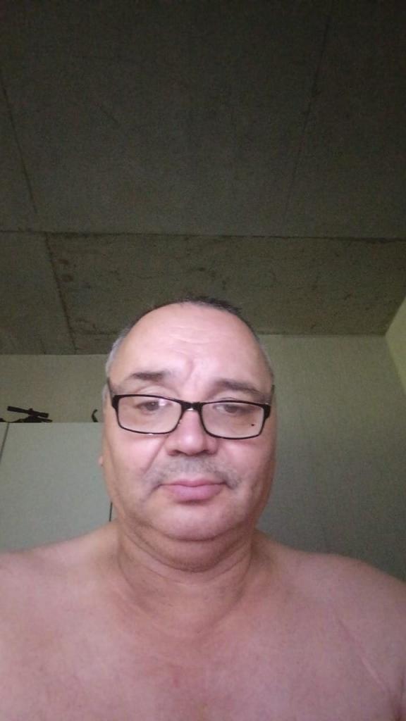 николай