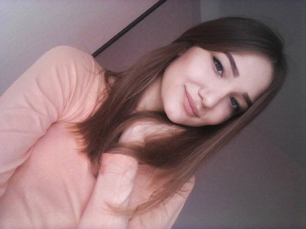 Оля