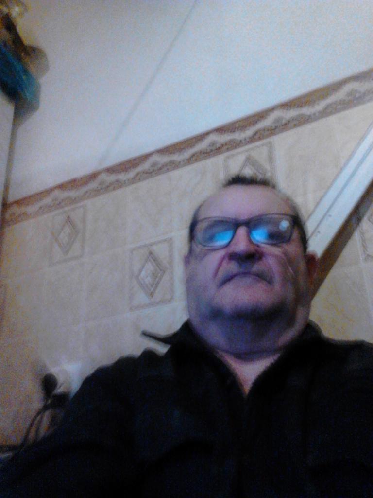 николай