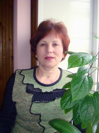 Мила
