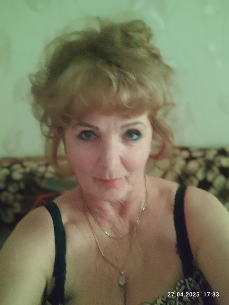 Мила