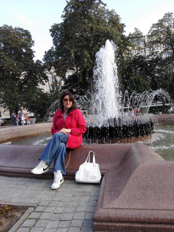 Мила