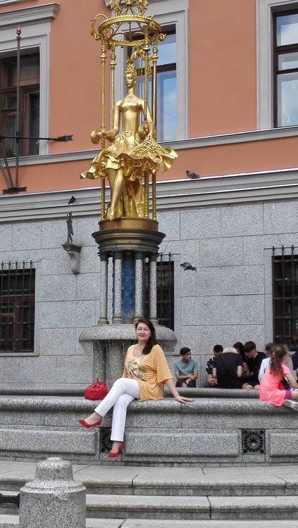 Мила