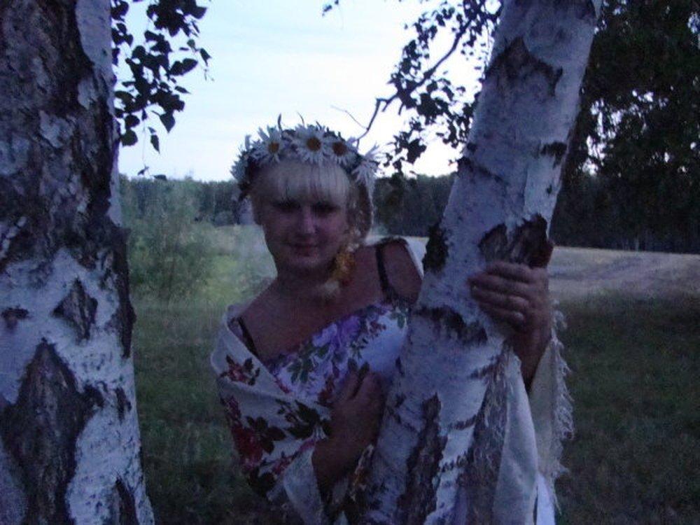 Оля