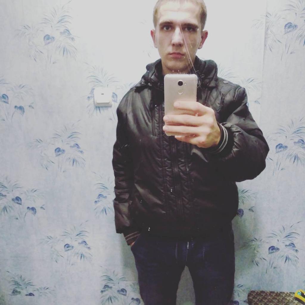 Николай
